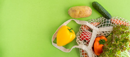 banner with Package-free food shopping. top view of eco friendly natural bag with vegetables. Zero waste concept. Sustainable lifestyle concept. Plastic free items. Flat lay. Copy spaceの写真素材