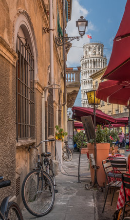 Tower of Pisa from local pizzeria with Bikeのeditorial素材