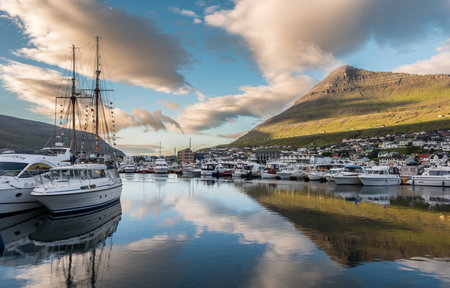 Sunrise over the port in town Klaksik in Faroe islandsのeditorial素材