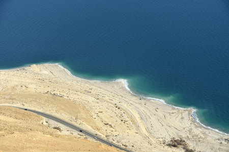 Aerial view of Dead Sea coast from Judea desert mountains, Israel.の写真素材