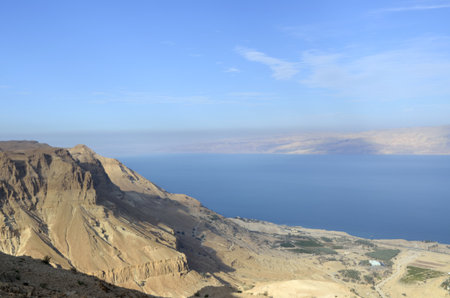 Aerial view of Dead Sea coast from Judea desert mountains, Israel.の写真素材