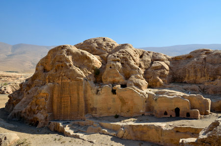 Ancient stone tombs in National park Little Petra, Jordan 