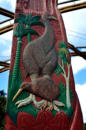 Red carved ornamental monument in Maori style, New Zealand.の写真素材