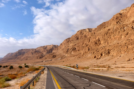 Empty highway leading to Dead Sea in Judea Desert, Israel.