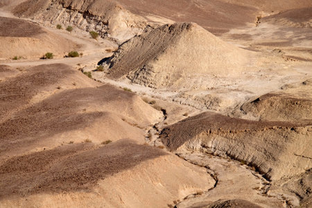 Dry winding riverbed near Dead Sea in Judea Desert.の写真素材