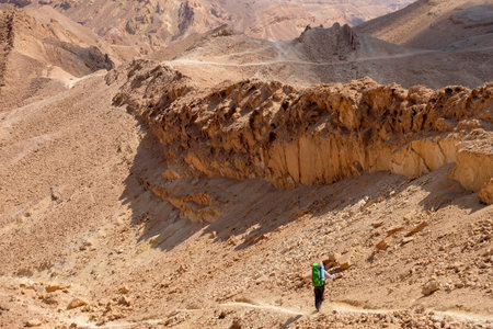One unrecognized hiker on desert trail in Negev mountains, Israel.の写真素材
