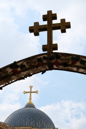 Coptic and Greek Orthodox crosses on sky background in Jerusalem.の写真素材
