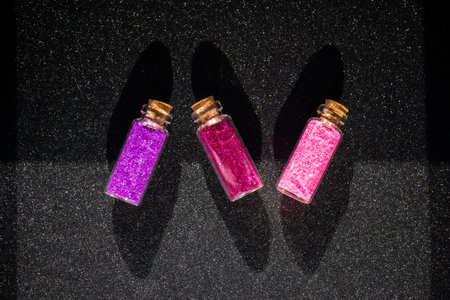 Glitter in a small bottlesの写真素材