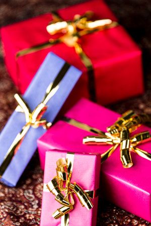 Presents packed for any occasion  Two packets in magenta, one in blue and one in crimson red  All...
