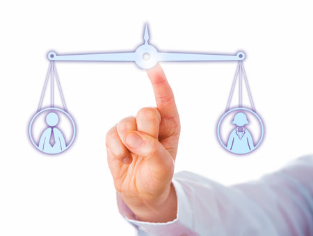 Index finger of a white collar worker is balancing out a female and a male knowledge worker icon on a virtual scale. Cutout isolated on white background. Business metaphor with gender dimension.の写真素材