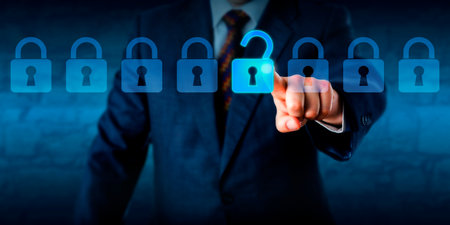 Manager is unlocking a virtual lock in a lineup of eight padlocks.の写真素材
