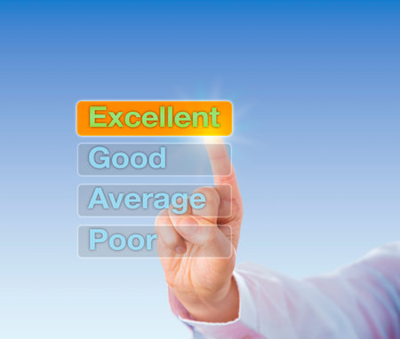 Index finger is selecting EXCELLENT on a touch screen interface. The Excellent button is highlighted atop four choices, followed by Good, Average and Poor. Business concept for performance appraisal.の写真素材