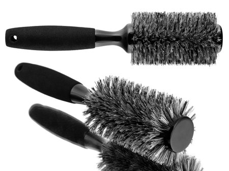 Black hairbrush set isolated on white backgroundの写真素材