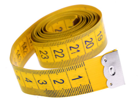 Centimeter tape detail isolated on white background