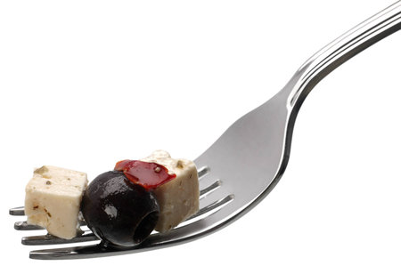 Cheese feta with olive and spice on forkの写真素材