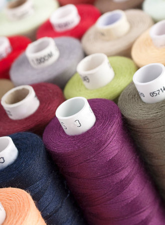 Sewing thread on bobbin closeup view