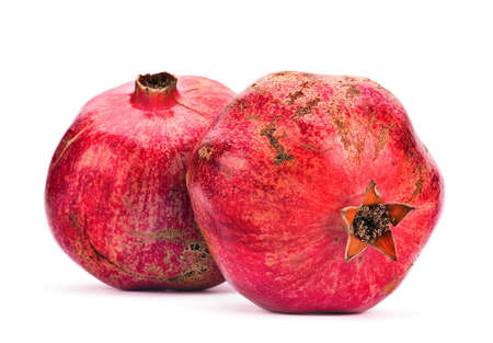 Pomegranate fruit closeup on white backgroundの写真素材