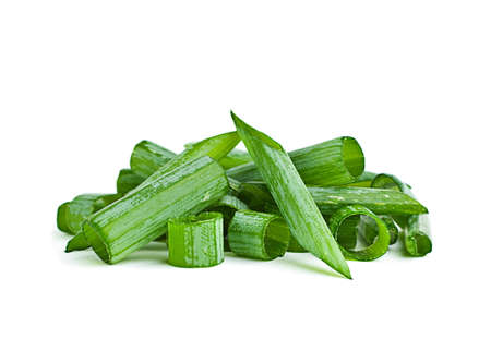 Green onion herb chopped isolated on whiteの写真素材