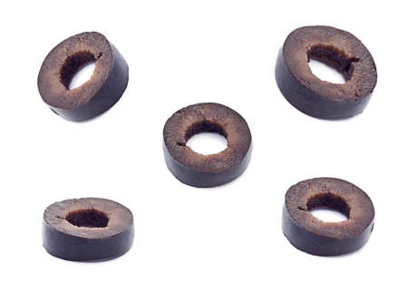 Marinated black olive closeup isolated on white backgroundの写真素材