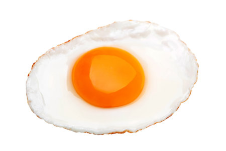 Chicken fried egg isolated on whiteの写真素材