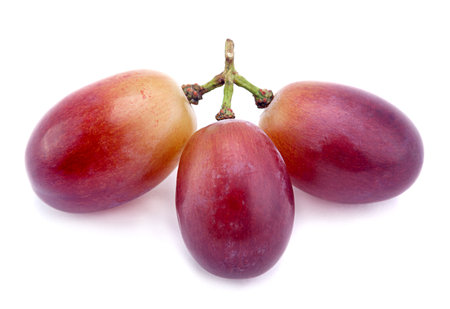 Violet grape fruit isolated on whiteの写真素材