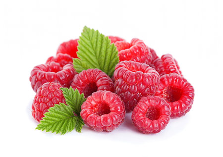 Raspberry fruit closeup with leaf isolated on white