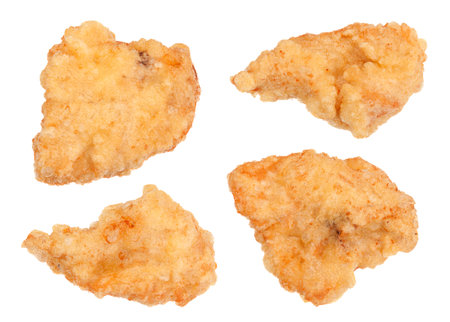 Chicken meat slice in batter isolated on whiteの写真素材