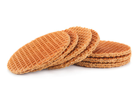 Holland round waffles with caramel isolated on whiteの写真素材