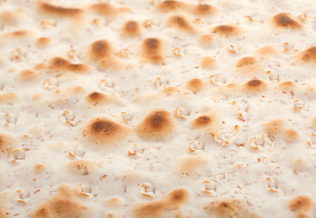 Matzo traditional jewish bread closeup background