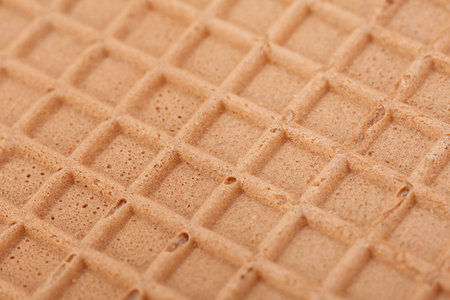 Brown wafer textured surface closeup backgroundの写真素材