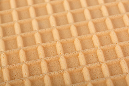 Brown wafer textured surface closeup backgroundの写真素材