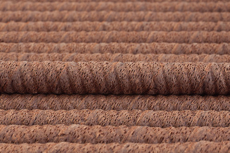 Waffle chocolate rolls stick closeup background