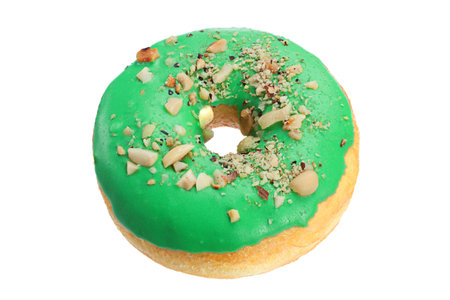 Green donut with nut  isolated on white backgroundの写真素材