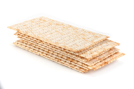Matzo traditional jewish bread isolated on white