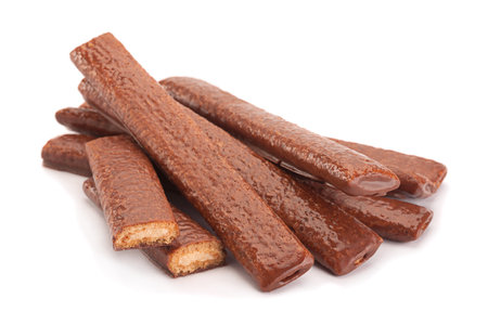 Cake sticks with chocolate glaze isolated on whiteの写真素材