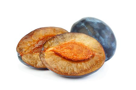 Blue plum fruit closeup isolated on white backgroundの写真素材