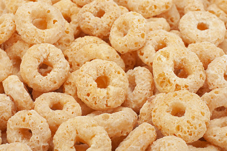 Sweet brekfast cereal rings closeup background