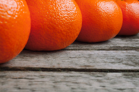 Oranges fruit on wooden table.