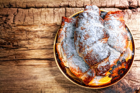 Fresh baked croissants on wooden backgroundの写真素材