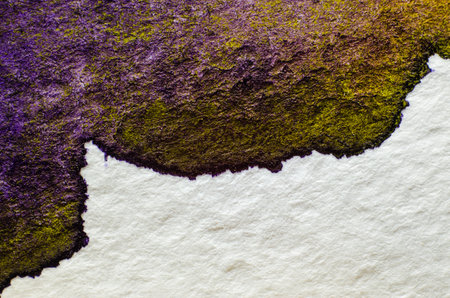 Purple watercolor stain on embossed paper on white background. Abstract watercolor patternの写真素材