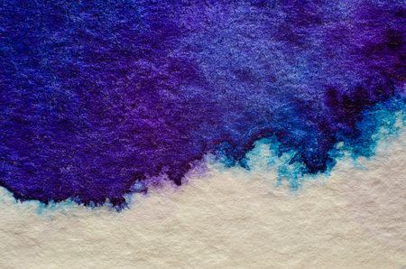 Blue watercolor stain on embossed paper on white background. Abstract watercolor patternの写真素材