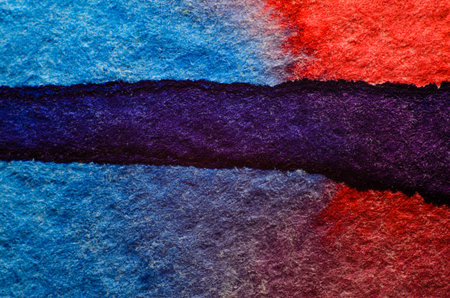 Blue red watercolor stain on embossed paper. Abstract watercolor pattern