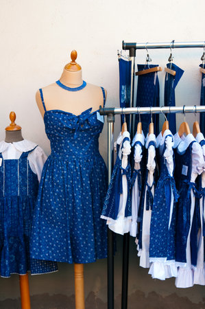 Blue dress of cotton chintz in shop. hungarian souvenirsの写真素材