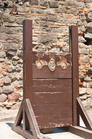 An old Guillotine against a cloudy sky