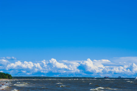 clouds on blue sky above the seaの写真素材