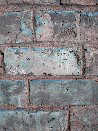 Large concrete gray brick with blue paint. Stone texture for poster, grunge design, construction...