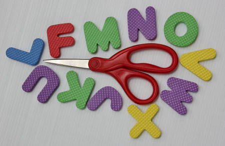 rubber alphabets and scissorsの写真素材