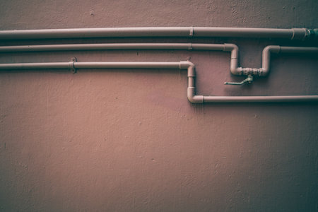 Abstract Iron pipe and background texture concrete wallの写真素材