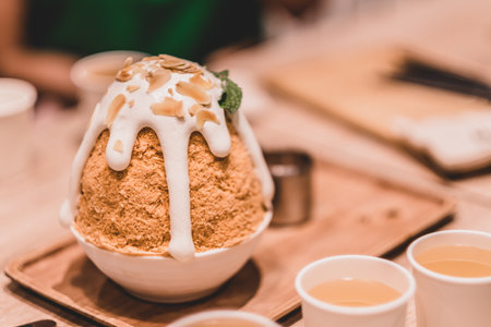 Cha Thai bingsu with white cream on top Desserts are placed on the table and ready to be served.の写真素材