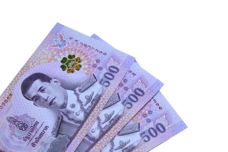 Closeup bank 500 bath thai conner with white background,stack of bank 500 bath thaiの写真素材